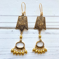 Long gold dangle earrings. Lenora Dame earrings. Gold statement earrings.