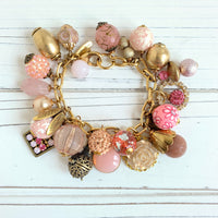 Pink bracelet for women. Gold charm bracelet with pink and gold charms. Valentines gift for her.
