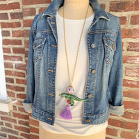 Tyrannosaurus Rex pendant necklace for women. Dinosaur charm necklace on a gold chain.