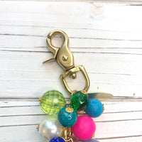 bag charm trigger clasp.