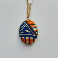Lenora Dame Orange Fabric Locket
