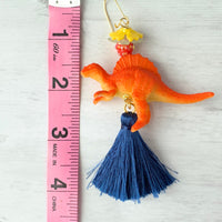 Lenora Dame Tangerine Spinosaurus Tassel Earrings
