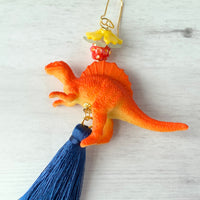 Lenora Dame Tangerine Spinosaurus Tassel Earrings