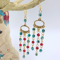 Red and green beaded chandelier earrings. Dangle Christmas earrings with red and green bead fringe.