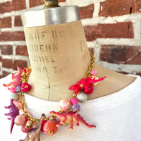Pink Carnation Dinosaur Necklace