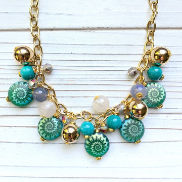 Sea green Czech glass ammonite charm necklace. Puff coin ammonite bead charm necklace. 