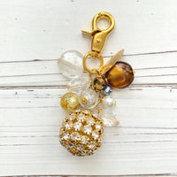 Rhinestone and gold bag charm for handbags. Cute beaded purse charm.