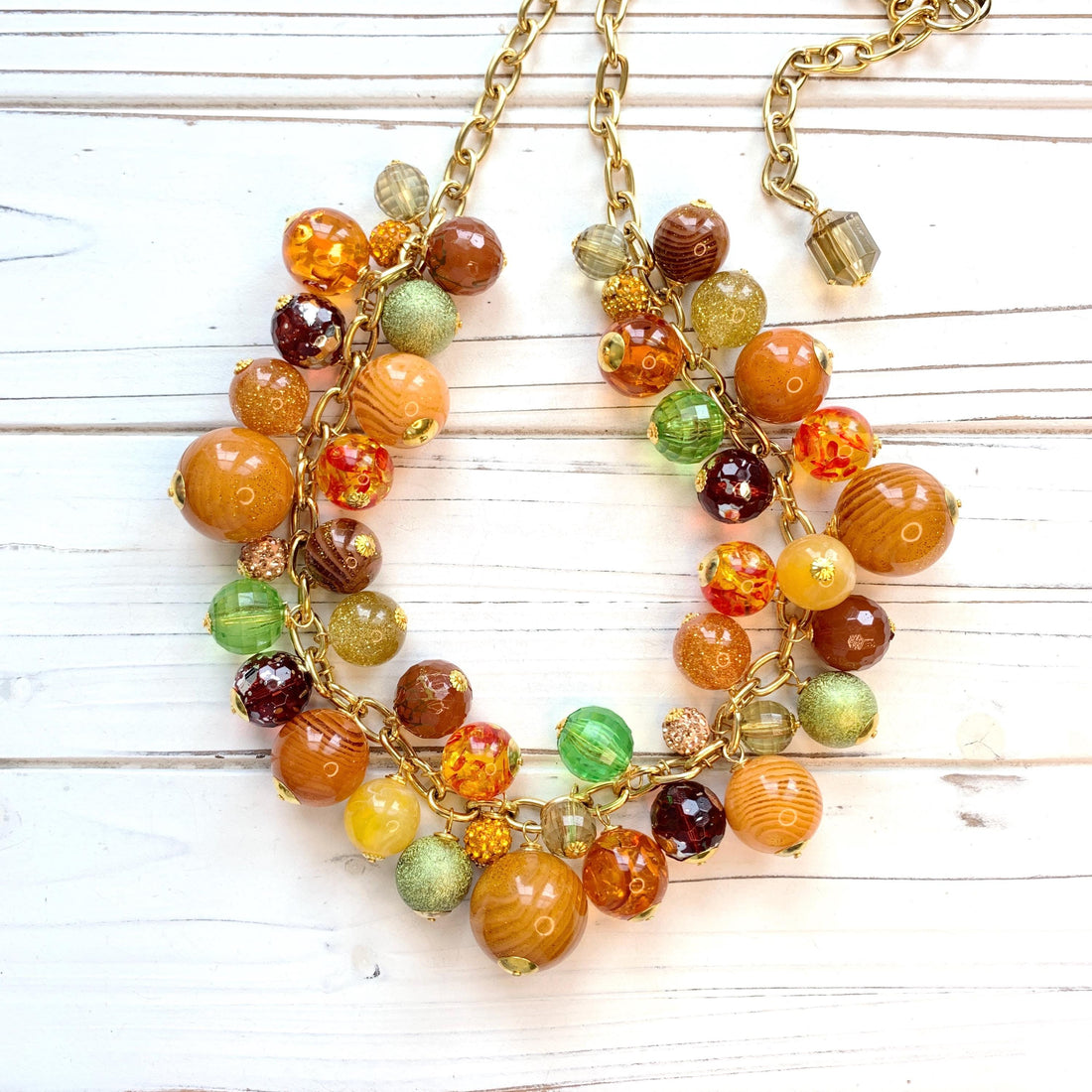 Chunky beaded necklace in fall colors for women. Orange statement necklace. 