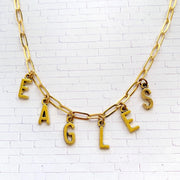 Philadelphia Eagles necklace. Gold paper clip chain necklace with letter charms that spell eagles.
