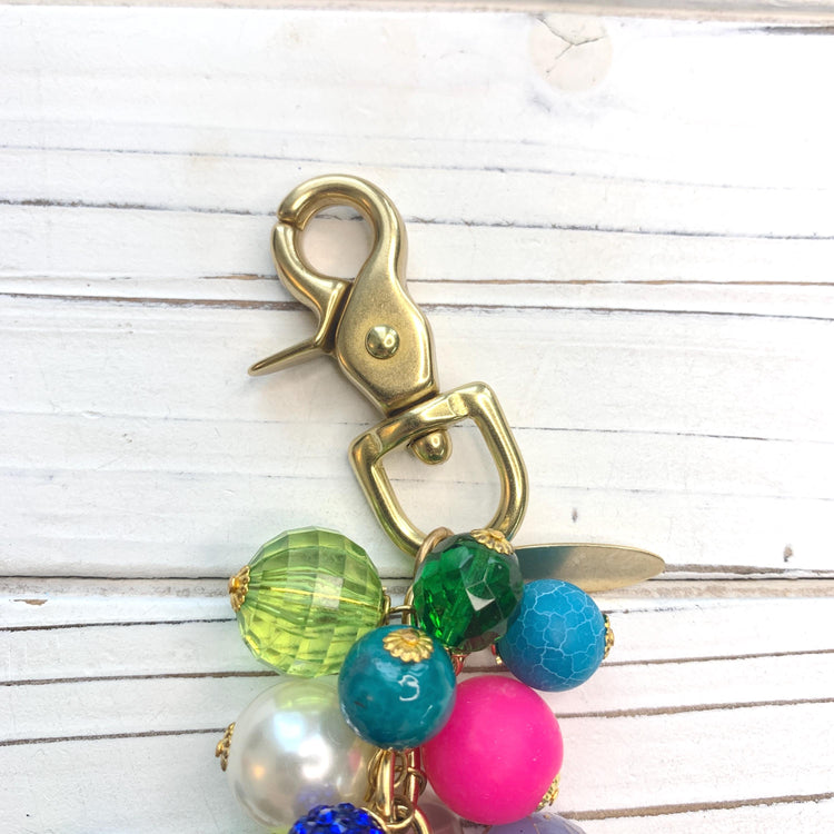 bag charm trigger clasp.