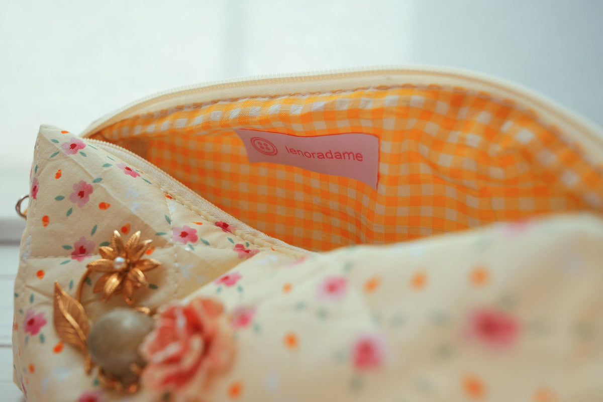 Lenora Dame One-of-a-Kind Brass-toned Daisy Quilted Cosmetic / Makeup bag