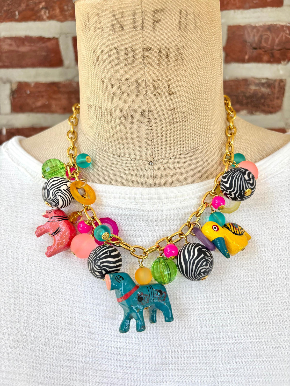 Lenora Dame Wooden Safari Animal Charm Necklace