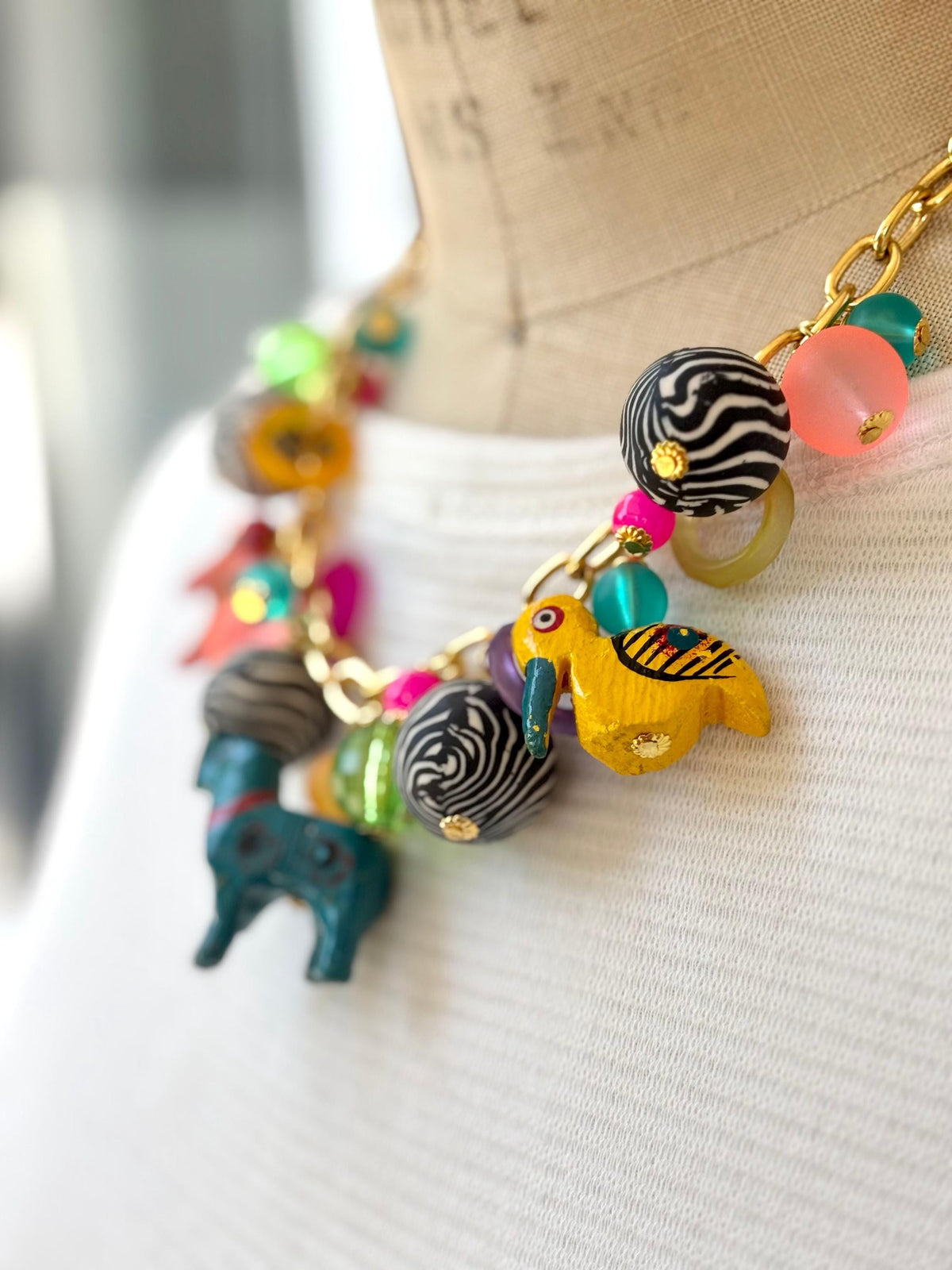 Lenora Dame Wooden Safari Animal Charm Necklace