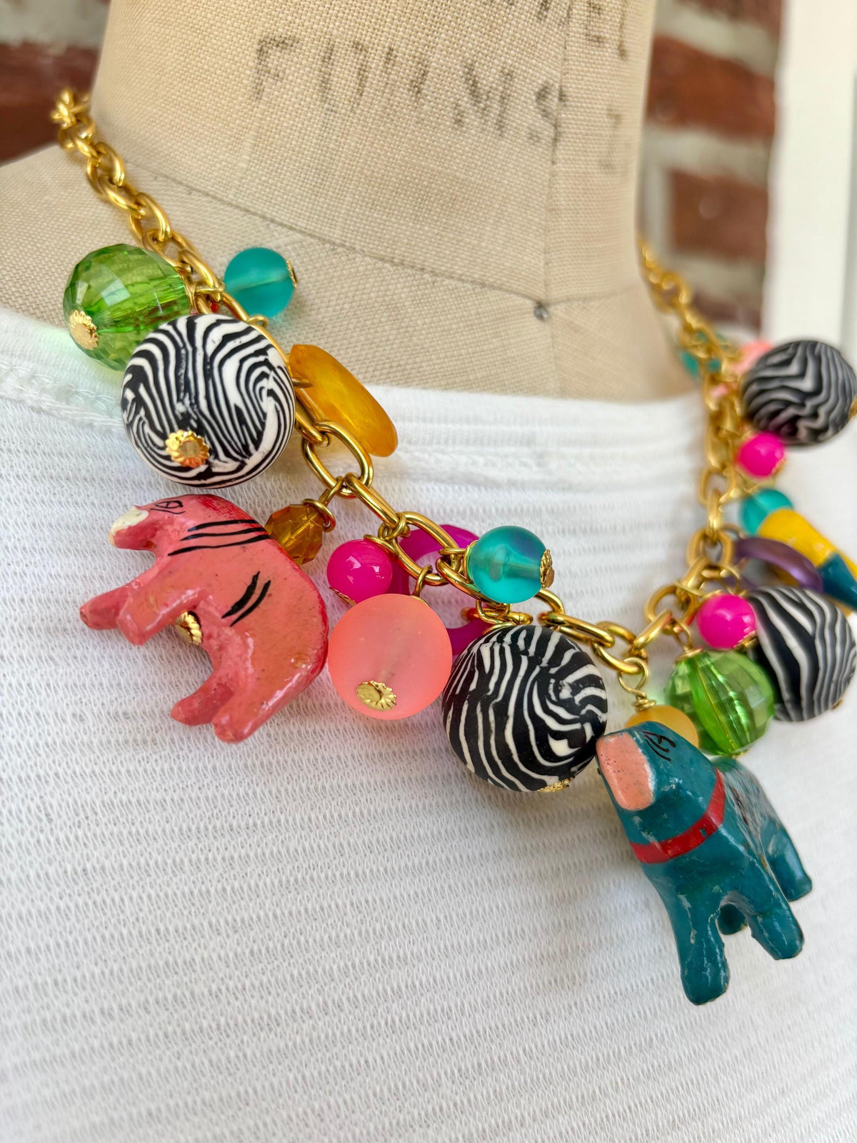 Lenora Dame Wooden Safari Animal Charm Necklace