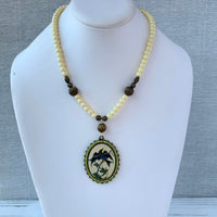 Lenora Dame  Nightshade Warbler Pendant