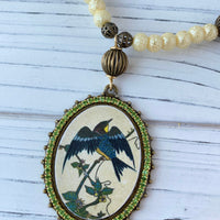 Lenora Dame  Nightshade Warbler Pendant