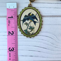 Lenora Dame  Nightshade Warbler Pendant
