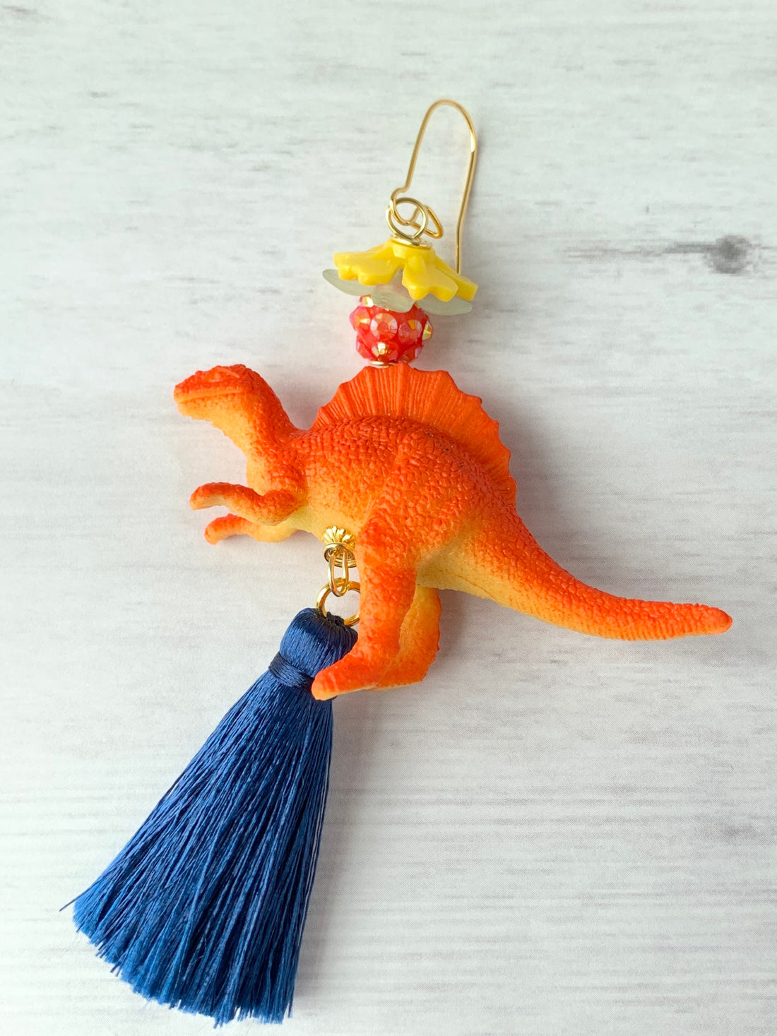 Lenora Dame Tangerine Spinosaurus Tassel Earrings