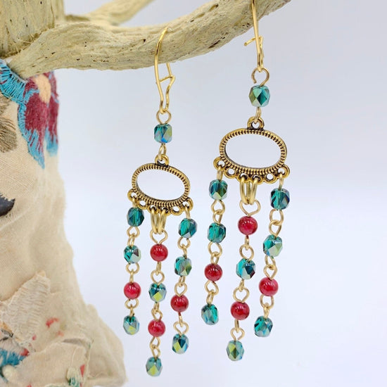 Red and green beaded chandelier earrings. Dangle Christmas earrings with red and green bead fringe.