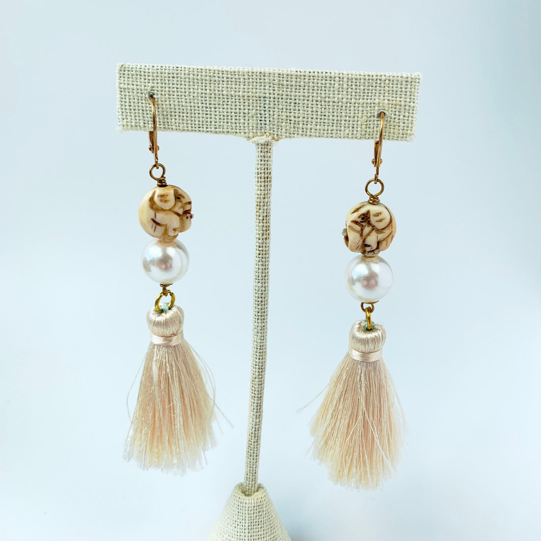 Lenora Dame Carved Elephant Tassel Earrings