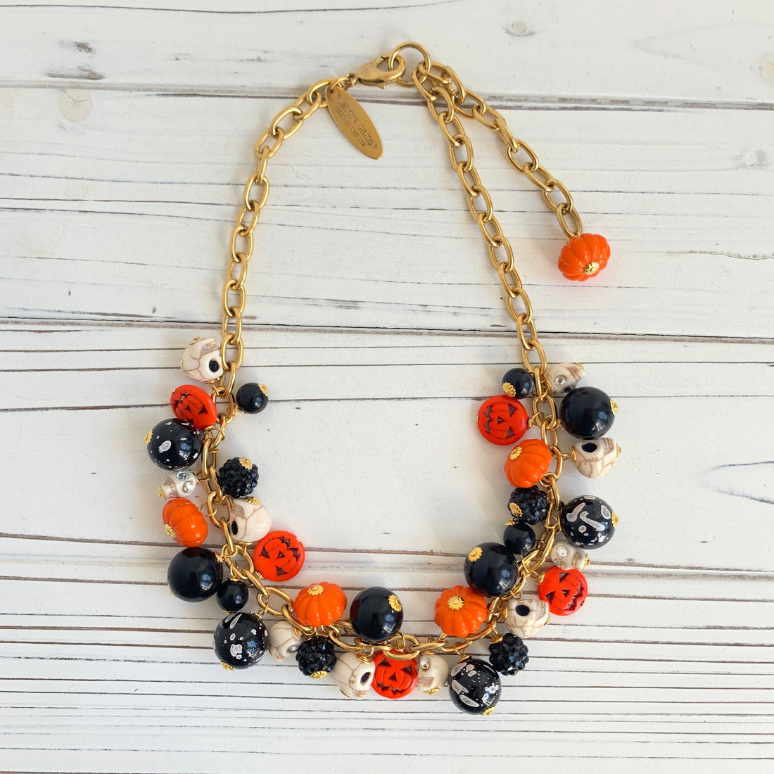 Gold plated cable chain Halloween necklace with orange pumpkins and carved jack-o&